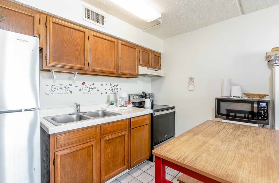 Our charming, homey kitchen is perfect for whipping up a light snack between trips out to the sand.