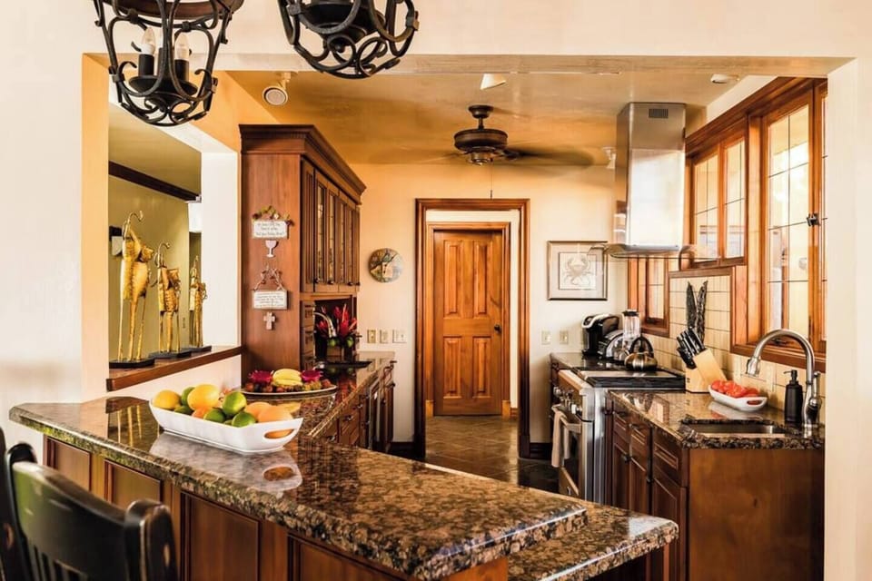 Top-of-the-line kitchen in this Tamarindo villa rental, featuring a gas stovetop, modern appliances, and all the tools you need to cook fresh local meals during your beach vacation.