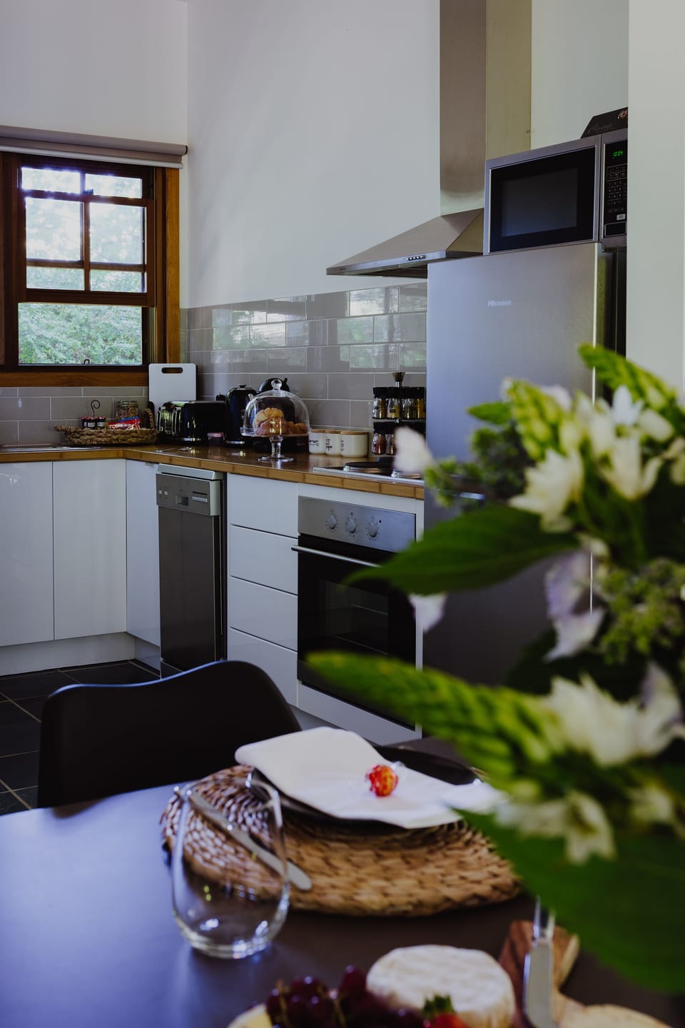 Fully equipped kitchen. Dishwasher, full size fridge, microwave, and oven