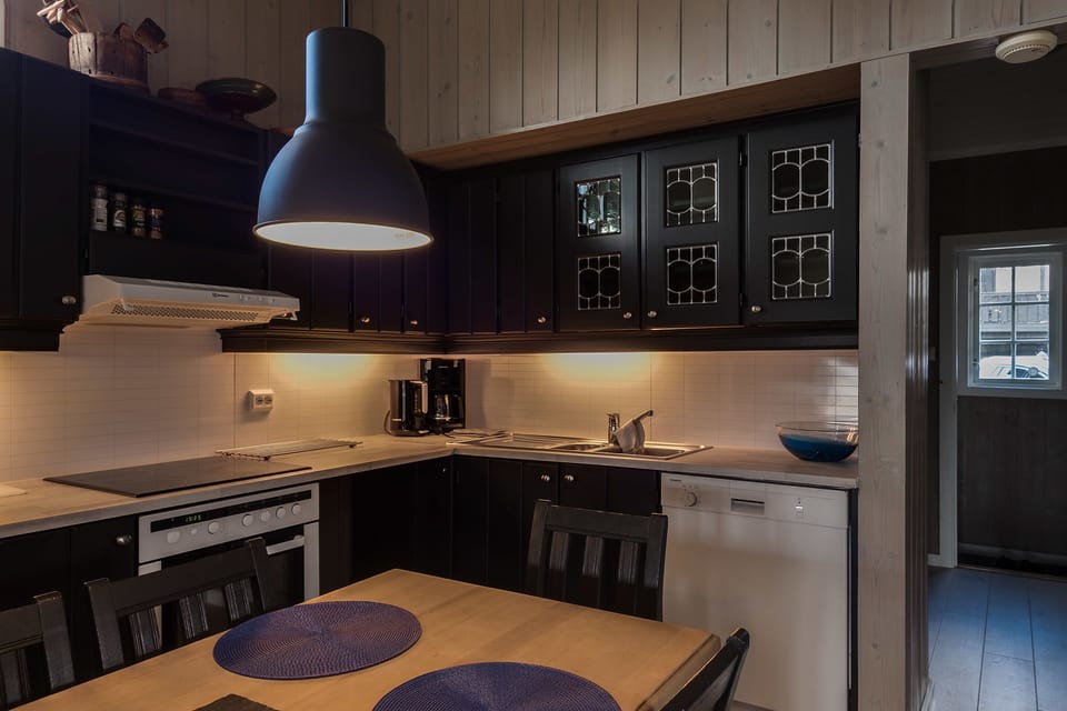 Cabin, 2 Bedrooms | Private kitchen | Coffee/tea maker, full-size fridge, stovetop, dishwasher