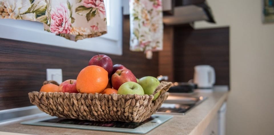 Family Deluxe Room | Private kitchen | Fridge, cookware/dishes/utensils