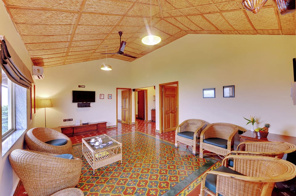 Villa | Living area | 32-inch LED TV with cable channels, TV, foosball
