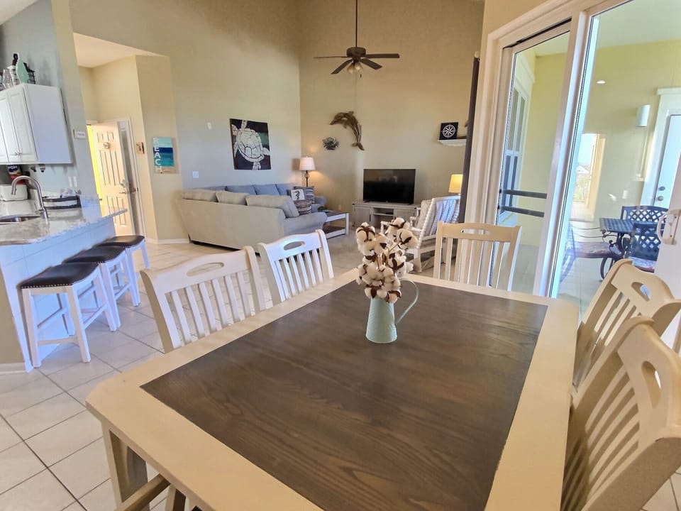 New dining table seats 6 and there is room for 3 more at the kitchen bar