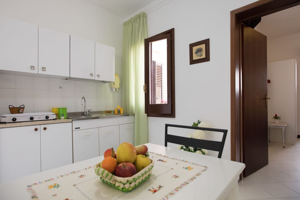 Deluxe Apartment, 1 Bedroom | Private kitchen | Full-size fridge, stovetop, espresso maker, coffee/tea maker
