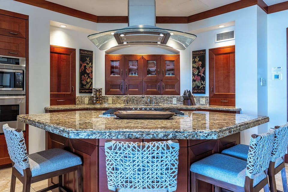 Open, airy, and bright kitchen with high end appliances