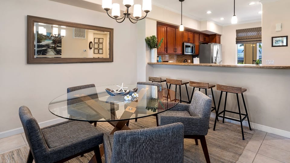 Round dining table can seat up to six