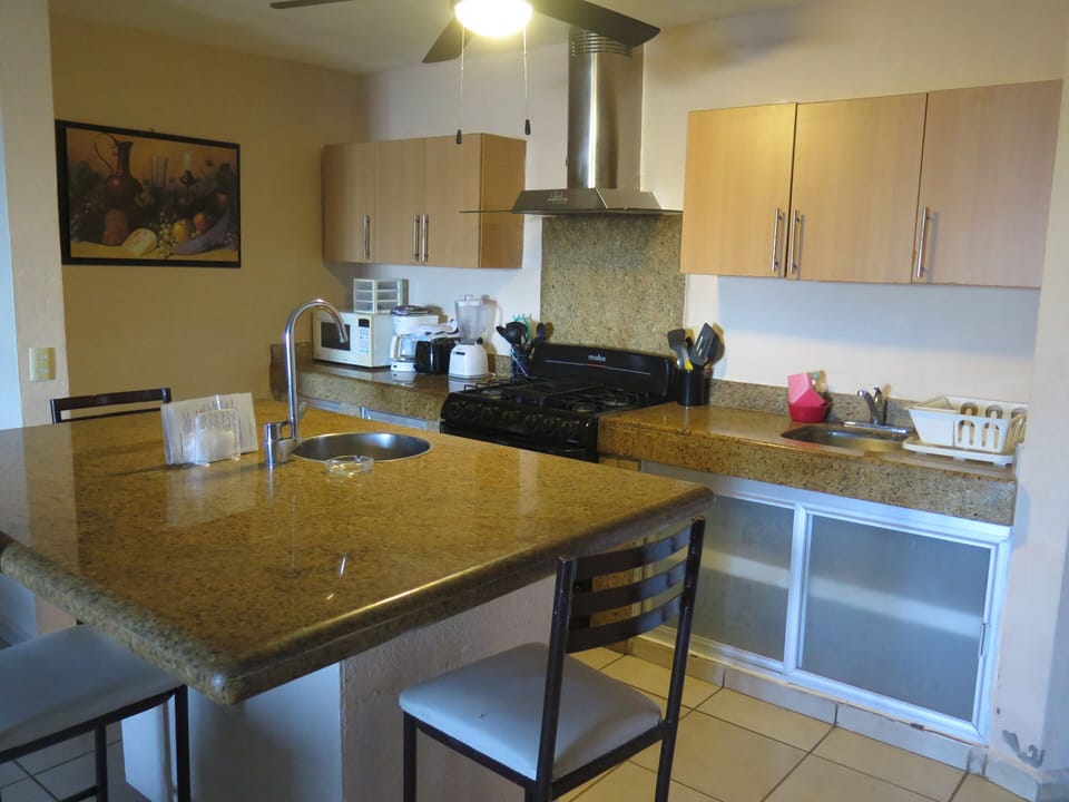 Fridge, microwave, coffee/tea maker, toaster
