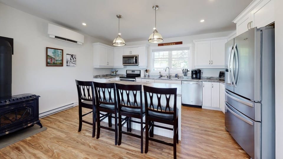 1ST FL: Open & spacious kitchen with stainless steel appliances.
