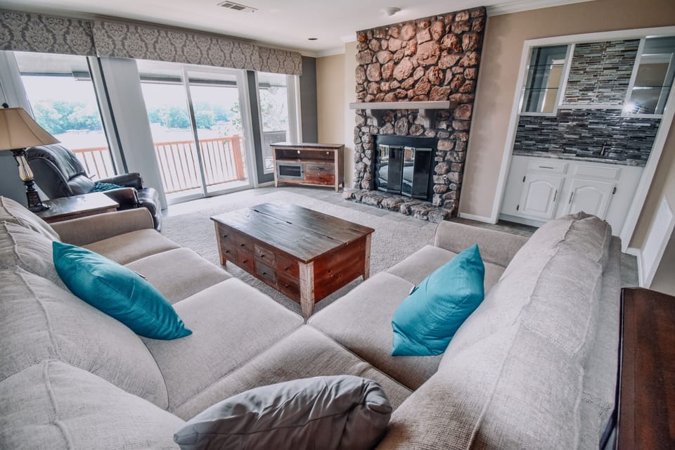 Living room (walks out onto balcony with lake view)