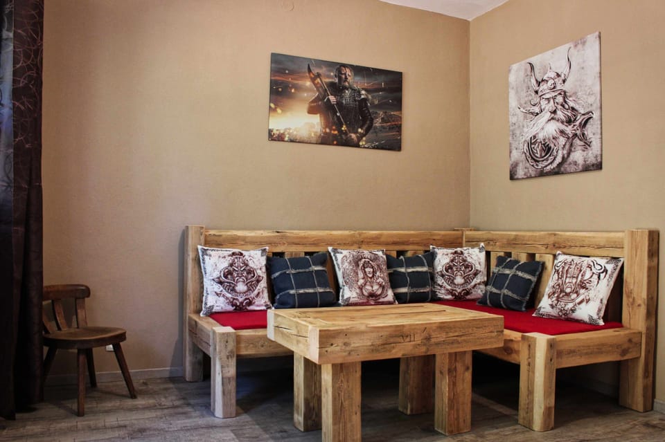 Design Suite, 1 Bedroom, Terrace | Living room | Flat-screen TV