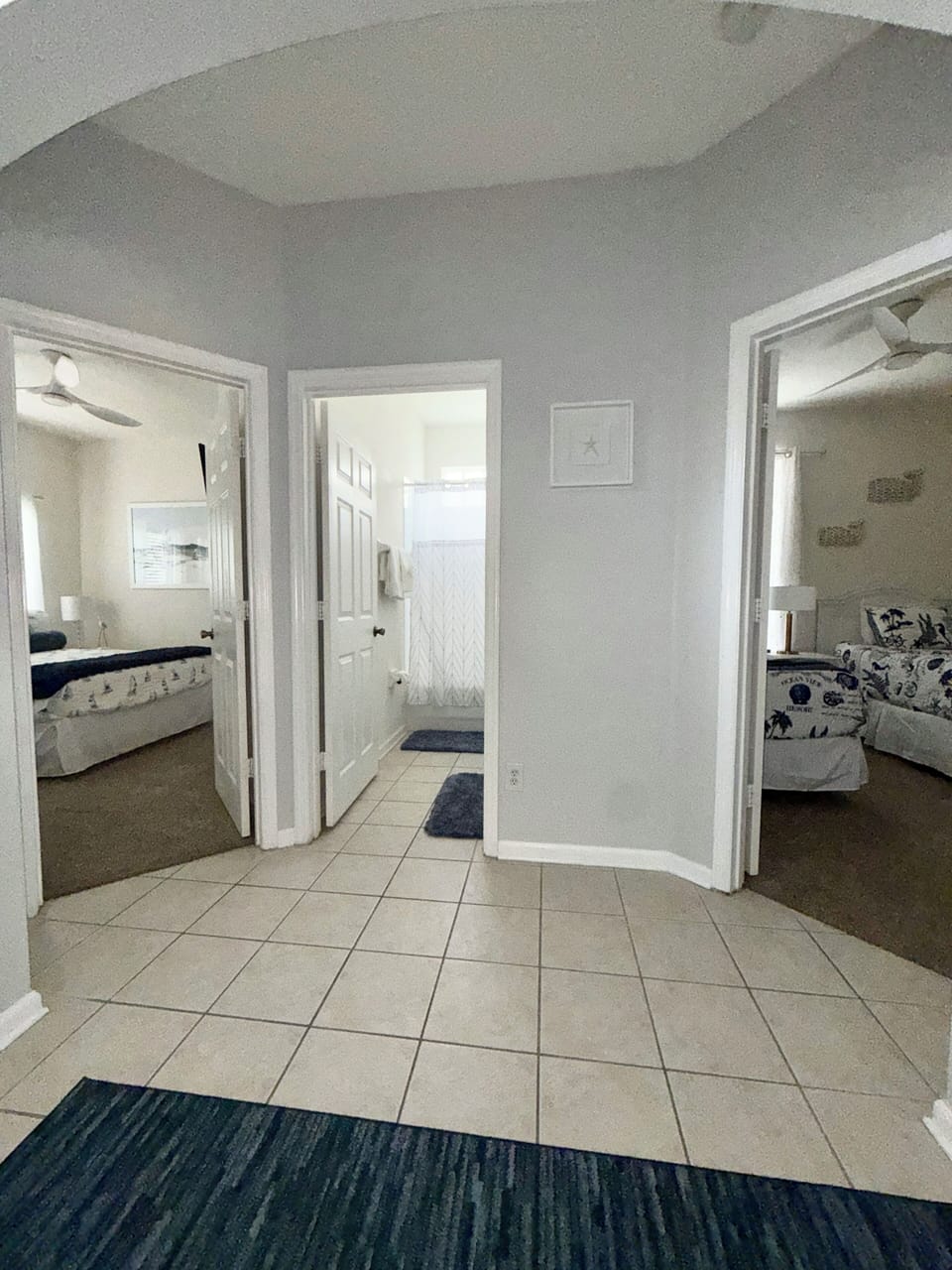 Grand foyer area opens into a Queen bedroom and a bedroom with two twin beds