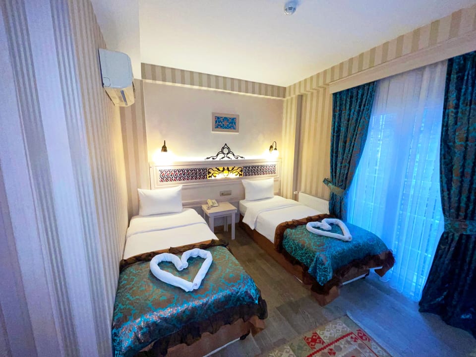 Standard Room, 2 Twin Beds | Premium bedding, in-room safe, desk, laptop workspace