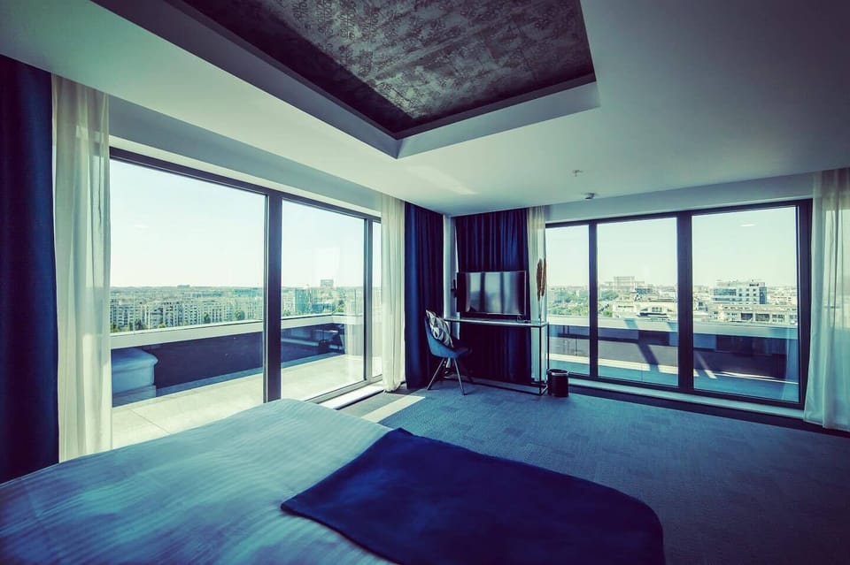 Executive Double Room (with Balcony) | Minibar, in-room safe, desk, laptop workspace