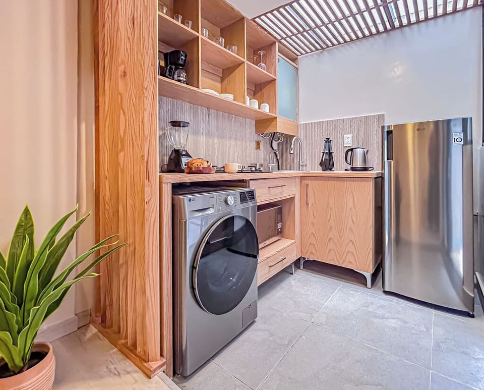 Signature Apartment | Private kitchen | Full-size fridge, microwave, espresso maker, coffee/tea maker