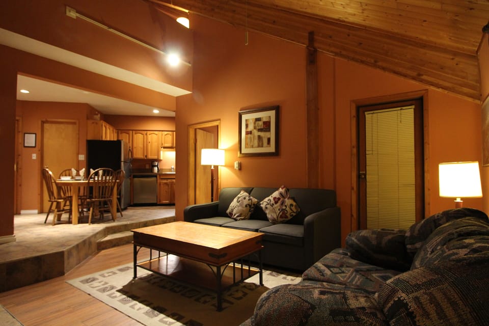 Standard Loft, 2 Bathrooms, Courtyard View | Living area | 32-inch flat-screen TV with cable/satellite channels, TV, fireplace