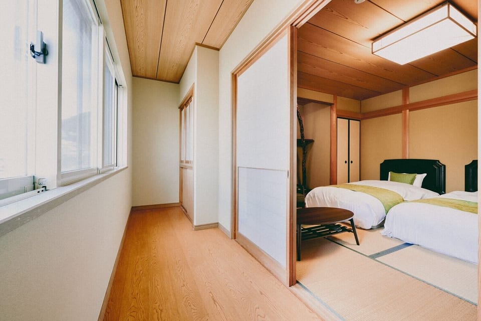 Deluxe Suite, Multiple Beds, Shared Bathroom, Mountainside (Non Smoking) | Blackout drapes, WiFi (free), bed sheets