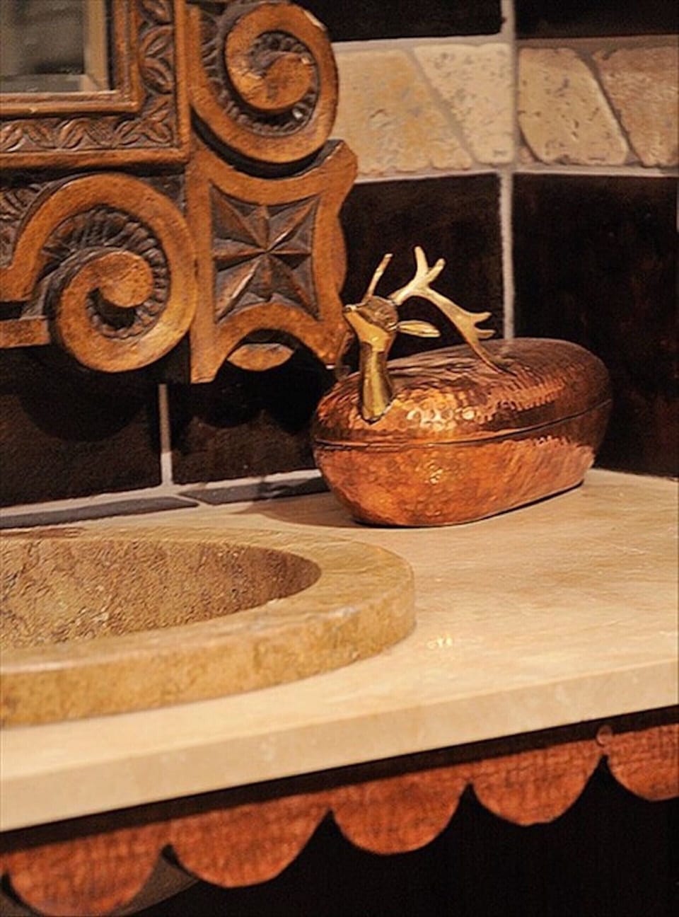 Many hand-carved details in mahogany, knotty alder, stone, bronze, iron.