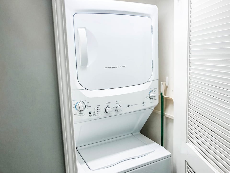 Laundry room located behind front door