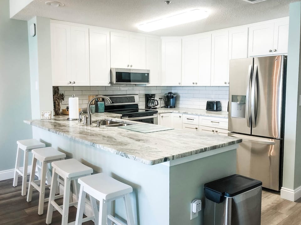 New granite countertops, cabinets & bar stools