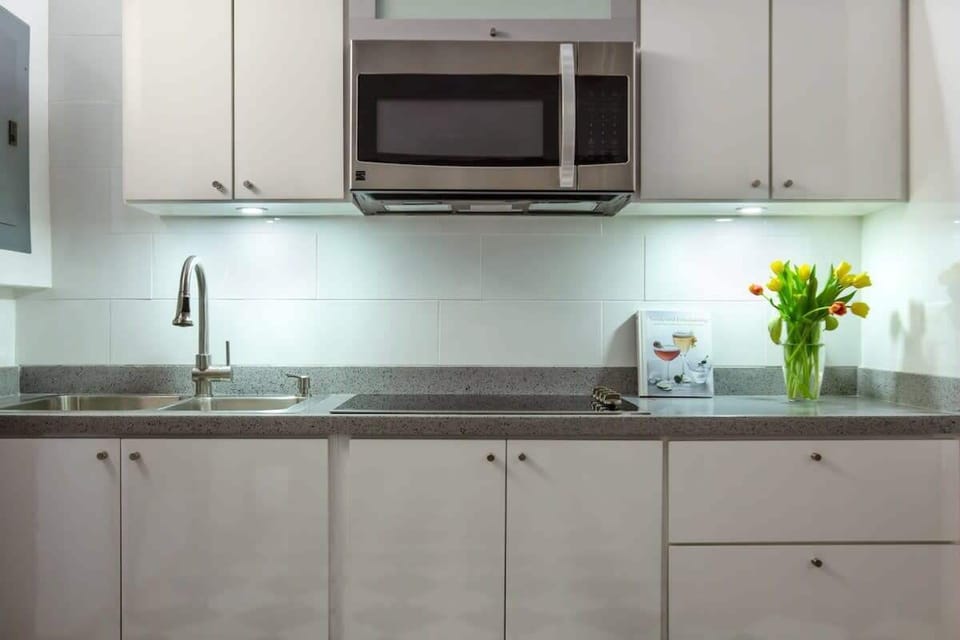 White cabinets with granite counter tops