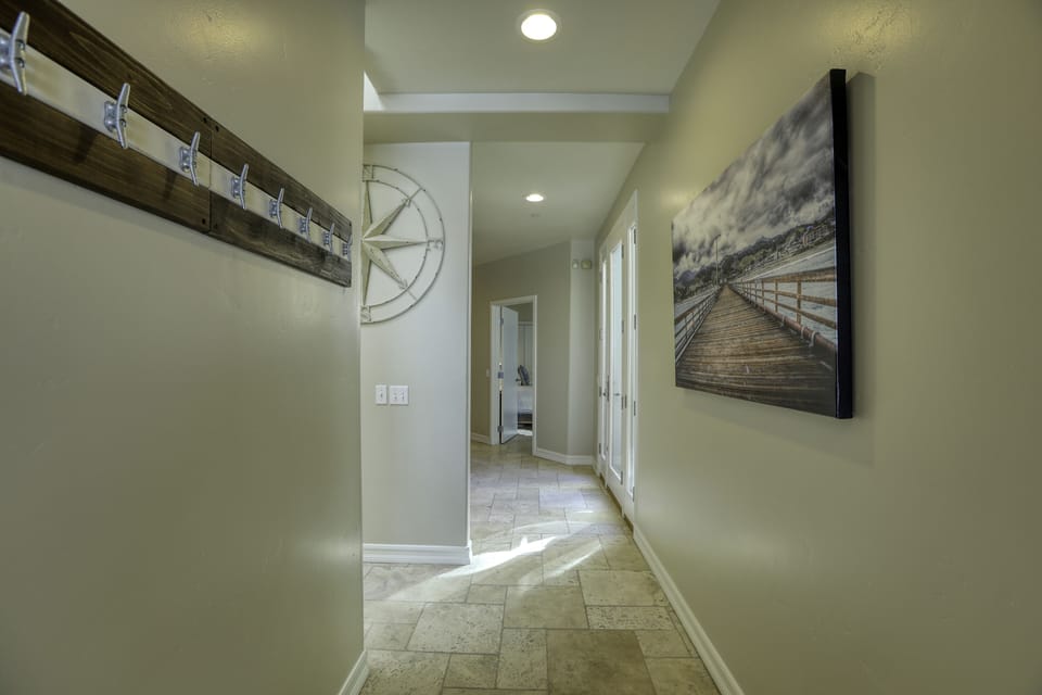 The master ensuite is the first room to the right off the hallway.