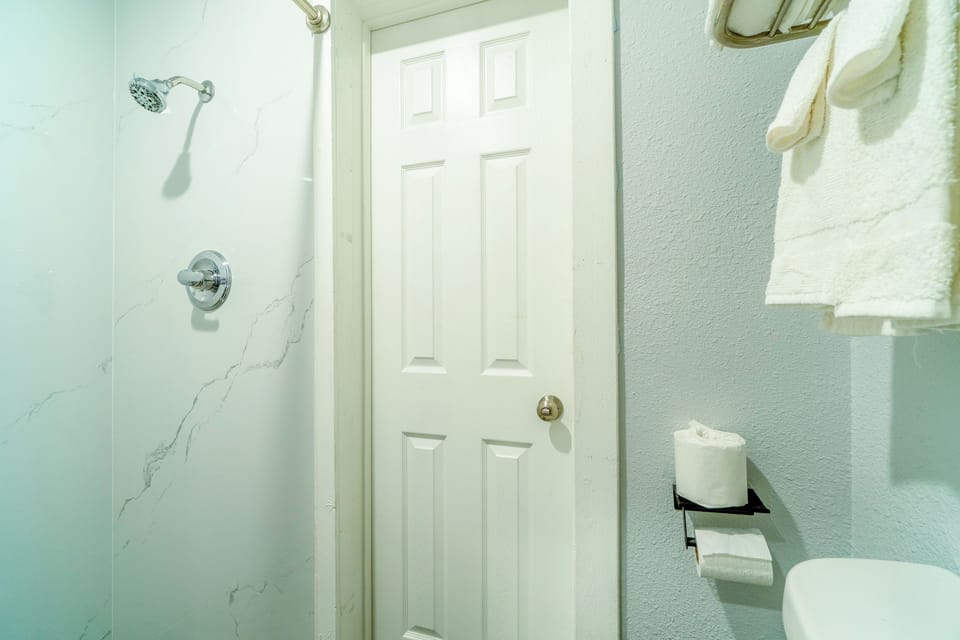 Room, 2 Queen Beds, Non Smoking | Bathroom | Shower, free toiletries, towels, soap