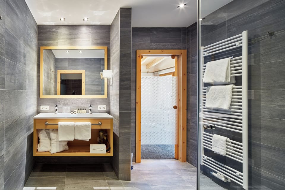 Family Suite, Balcony | Bathroom | Hair dryer, bathrobes, slippers, towels
