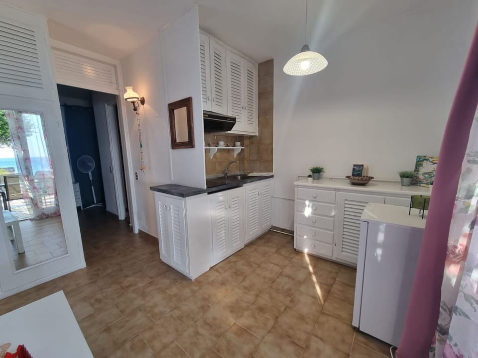 Apartment | Private kitchen | Fridge, stovetop, cookware/dishes/utensils
