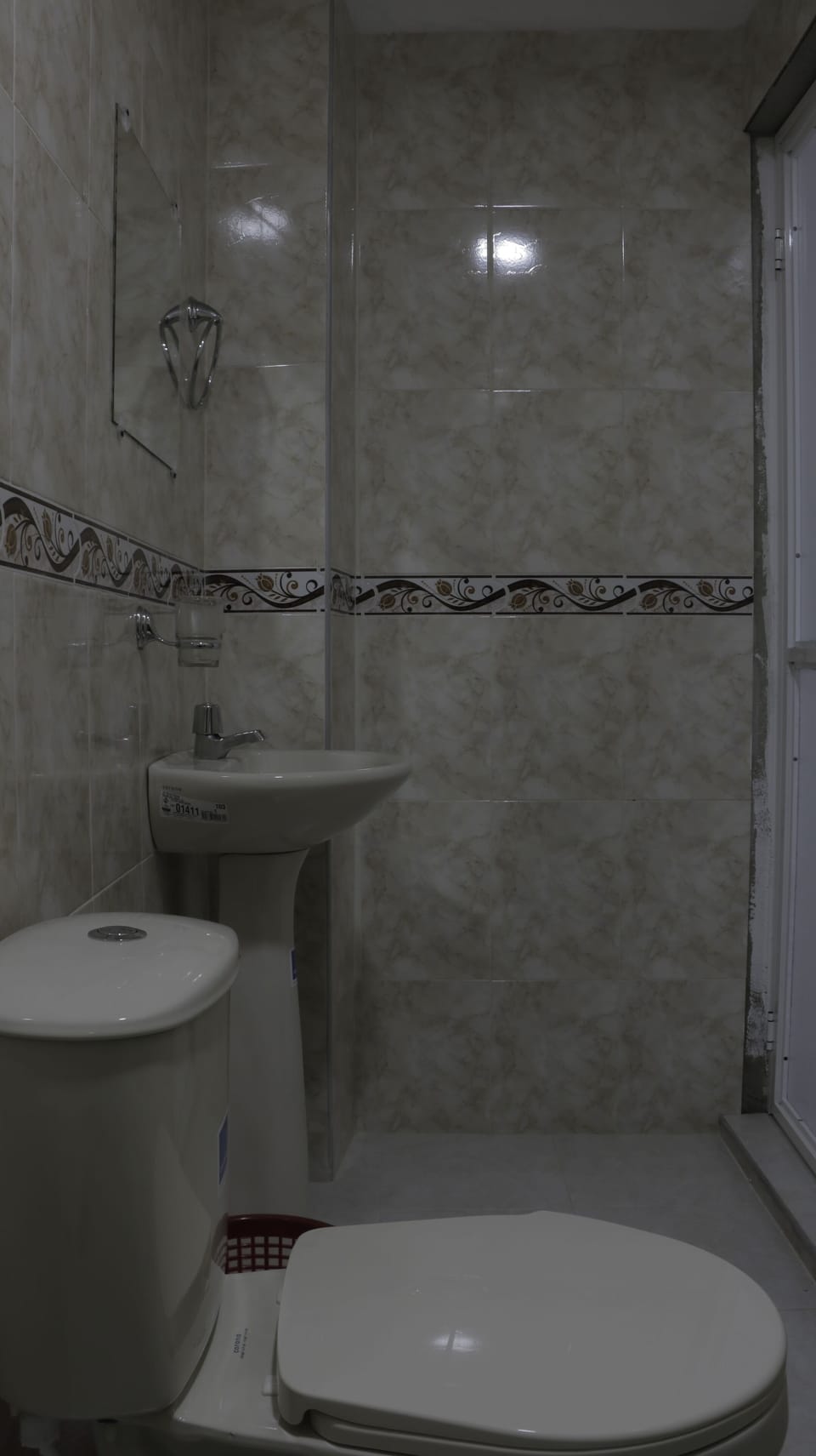 Bidet, towels, soap, toilet paper