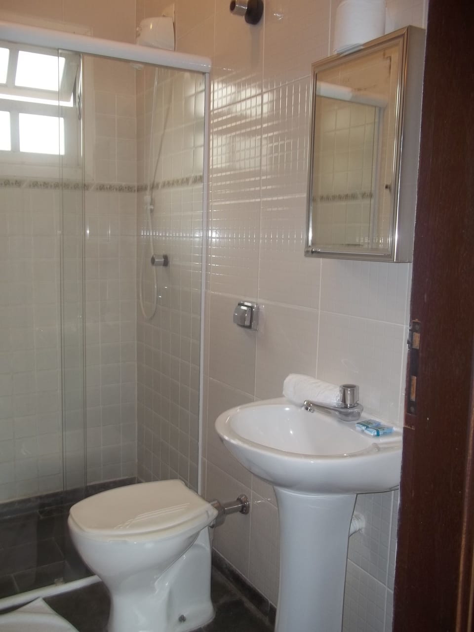 Double room with extra single bed | Bathroom | Shower, soap, toilet paper