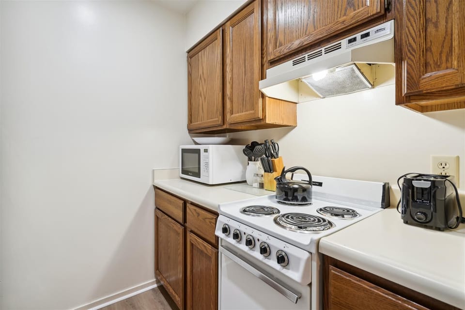 Cook your meals in this efficient kitchen.