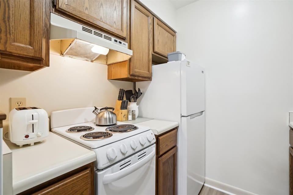 Cook your meals in this efficient kitchen.