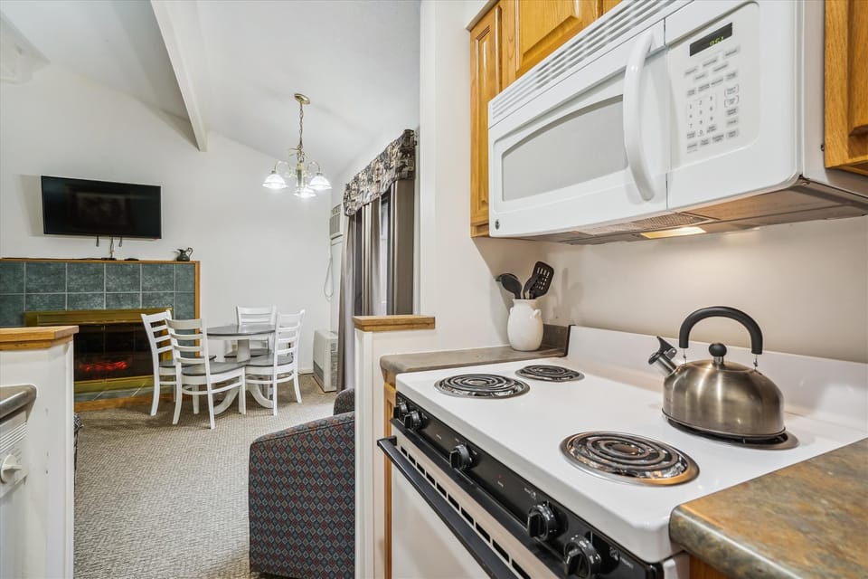 Cook your meals in this efficient kitchen.