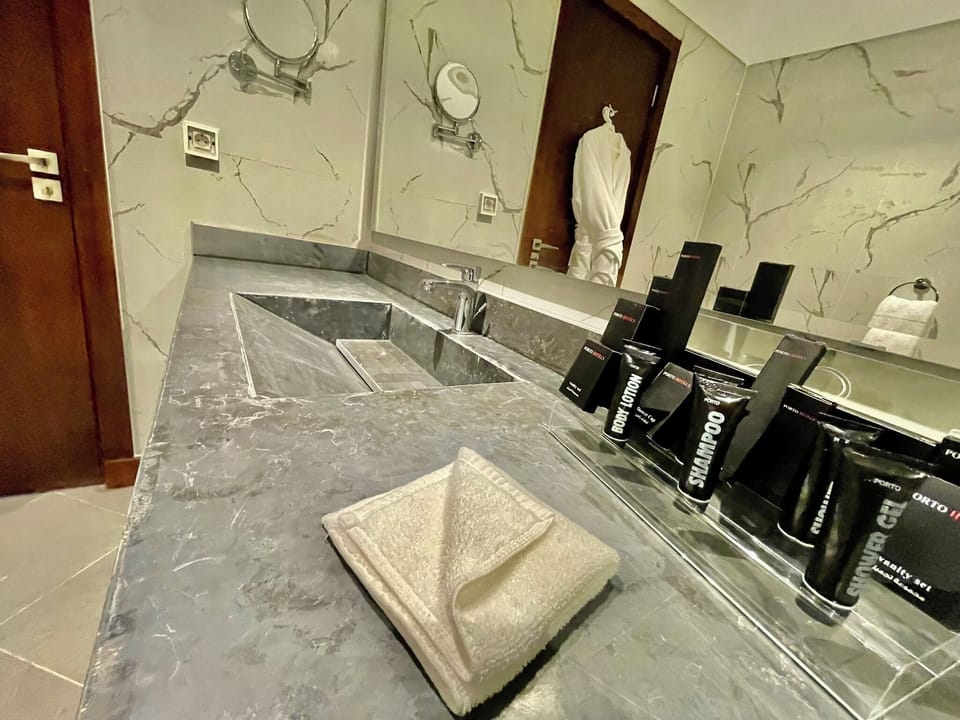 Shower, free toiletries, hair dryer, bathrobes
