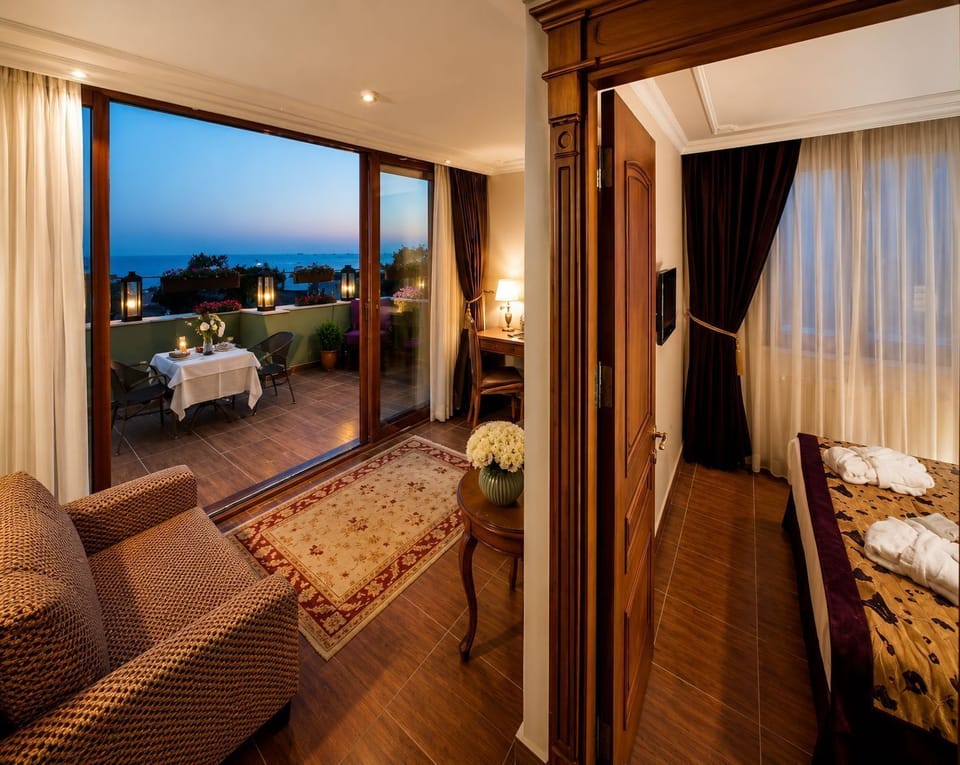 Executive Suite, Balcony, Sea View (King Bed with Sofabed) | Premium bedding, minibar, in-room safe, desk