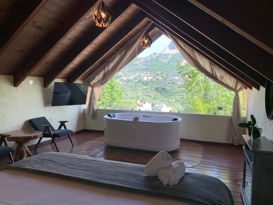 Elite Cabin, Mountain View | Premium bedding, down comforters, in-room safe, individually decorated
