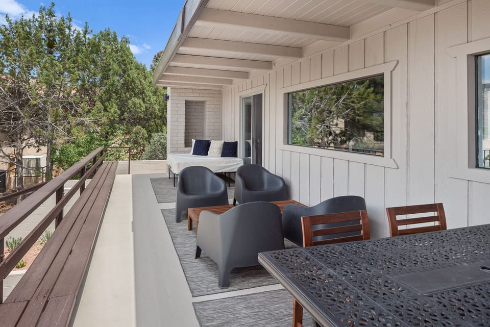 Front Patio and Dining - nestled in the corner is an oversized daybed. 