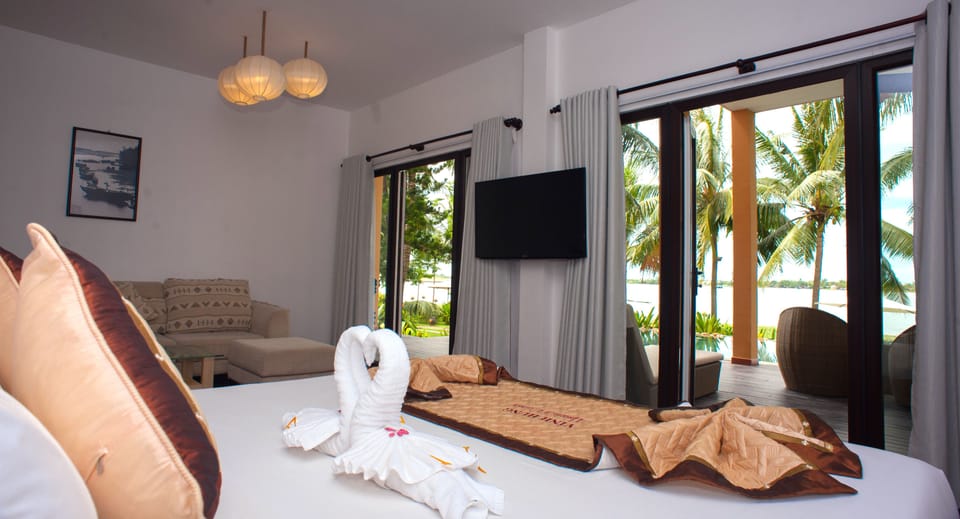 Suite, River View | Down comforters, minibar, in-room safe, individually decorated