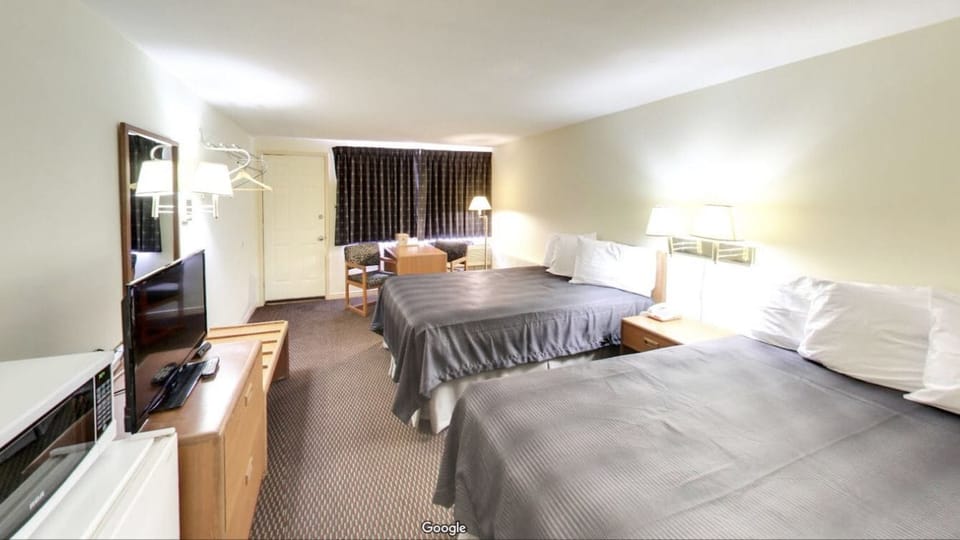 Desk, laptop workspace, free WiFi, bed sheets
