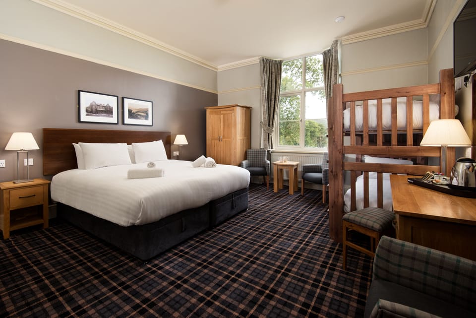 Family Room | Desk, iron/ironing board, free WiFi, bed sheets