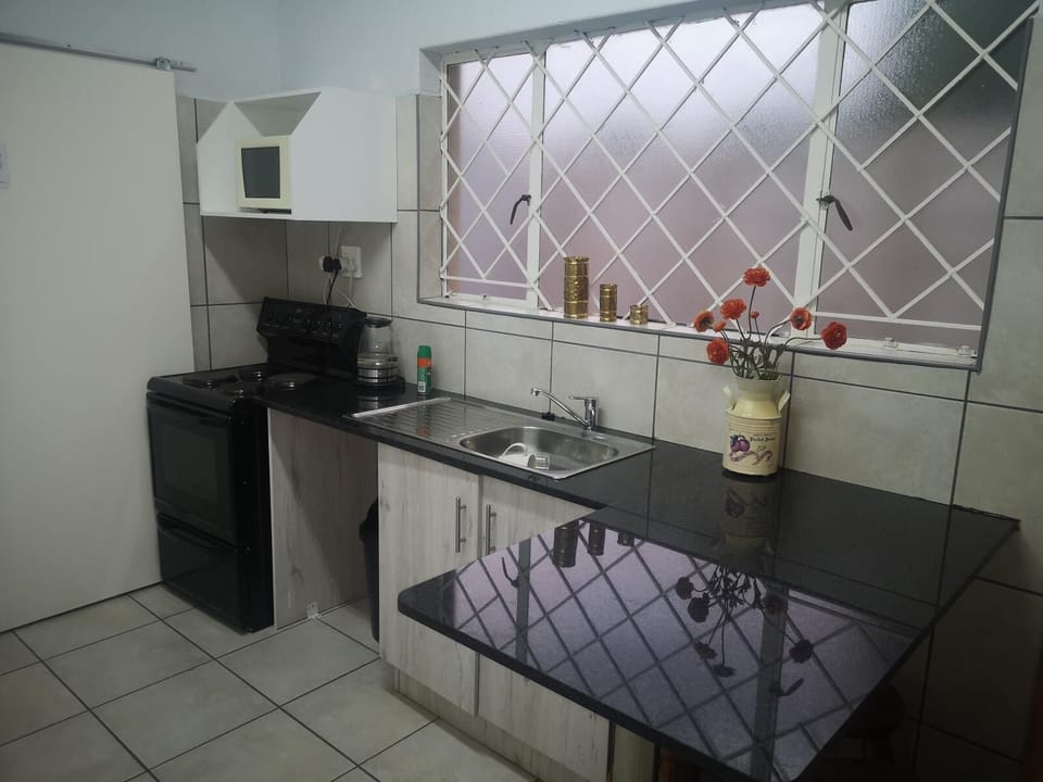 Room, 2 Bedrooms | Private kitchen | Fridge, coffee/tea maker, electric kettle