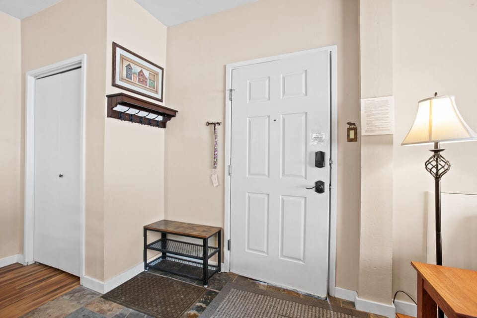 Entry with coat rack & closet
