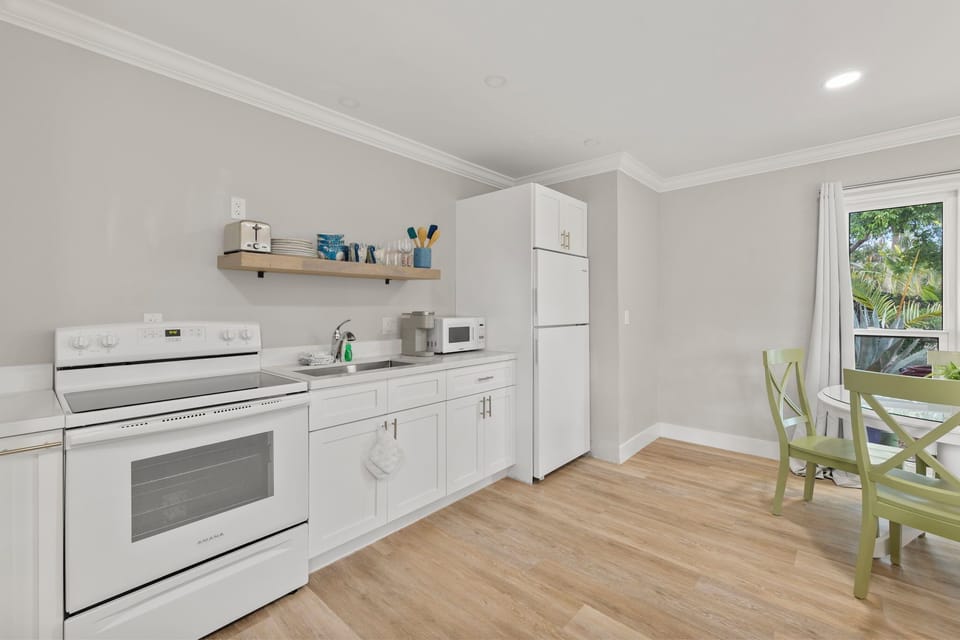 Open kitchen with ample cookware