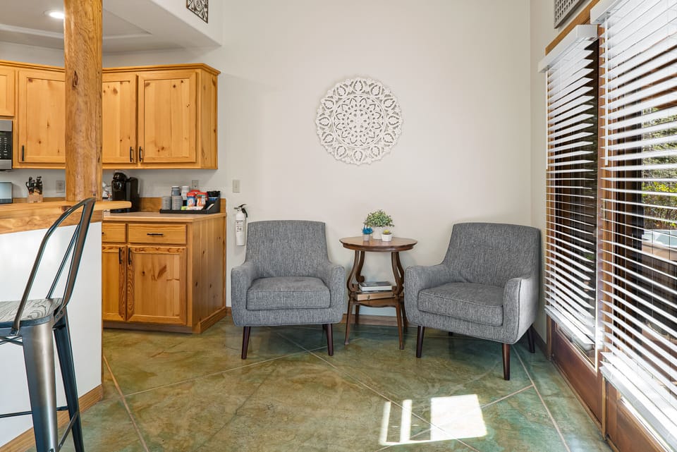 This seating area offers plenty of light and is the perfect spot for reading.