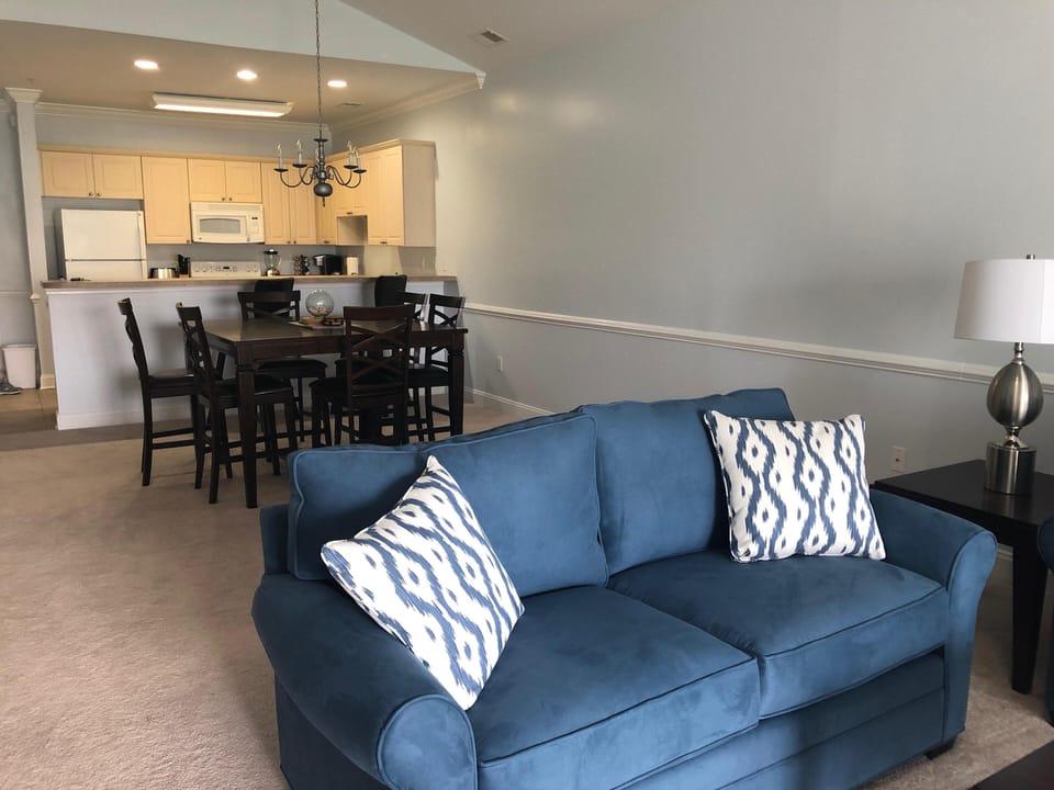 View of living room looking to the kitchen and dining rm 