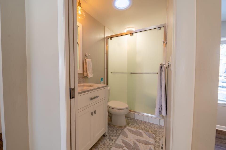 Second full bath with tile and marble shower/wifi speaker
