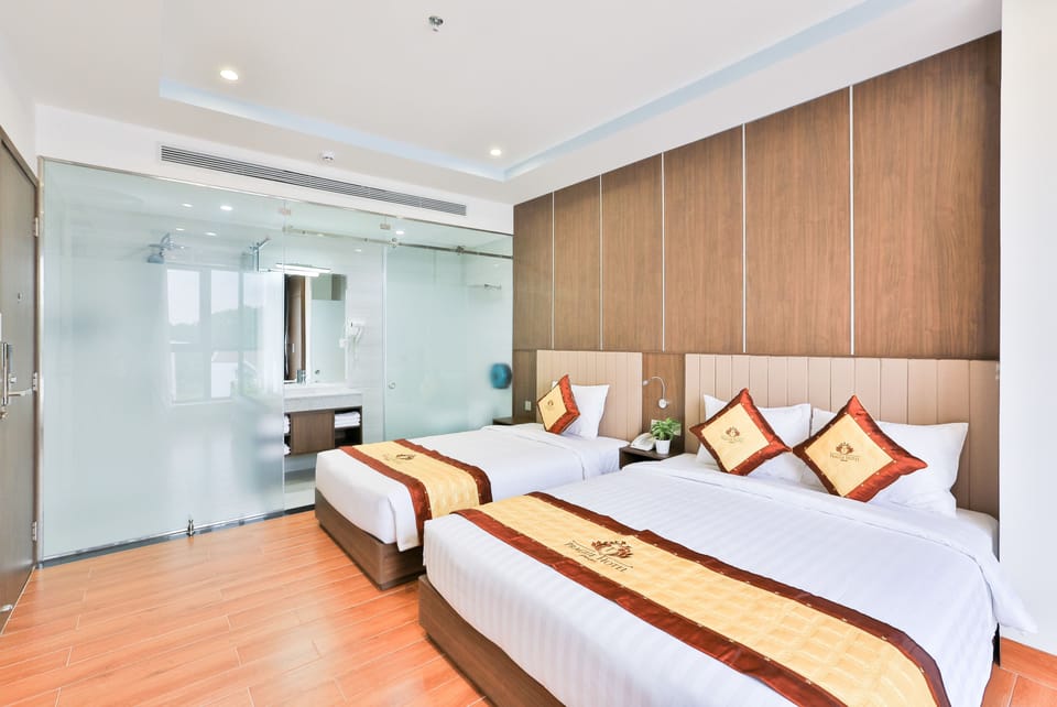 Deluxe Family Room | Premium bedding, minibar, in-room safe, desk