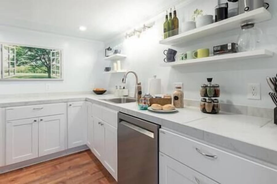 Sparkling kitchen has stainless steel full size appliances with a super quiet dishwasher 
