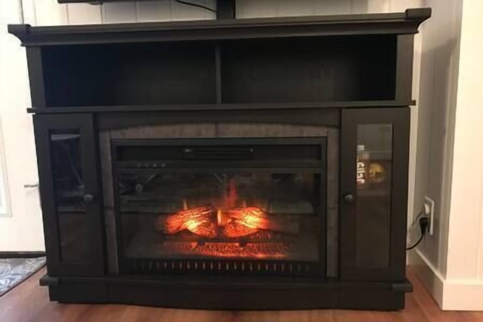 The fireplace with remote can generate heat (or not) and has several flame effects to choose from