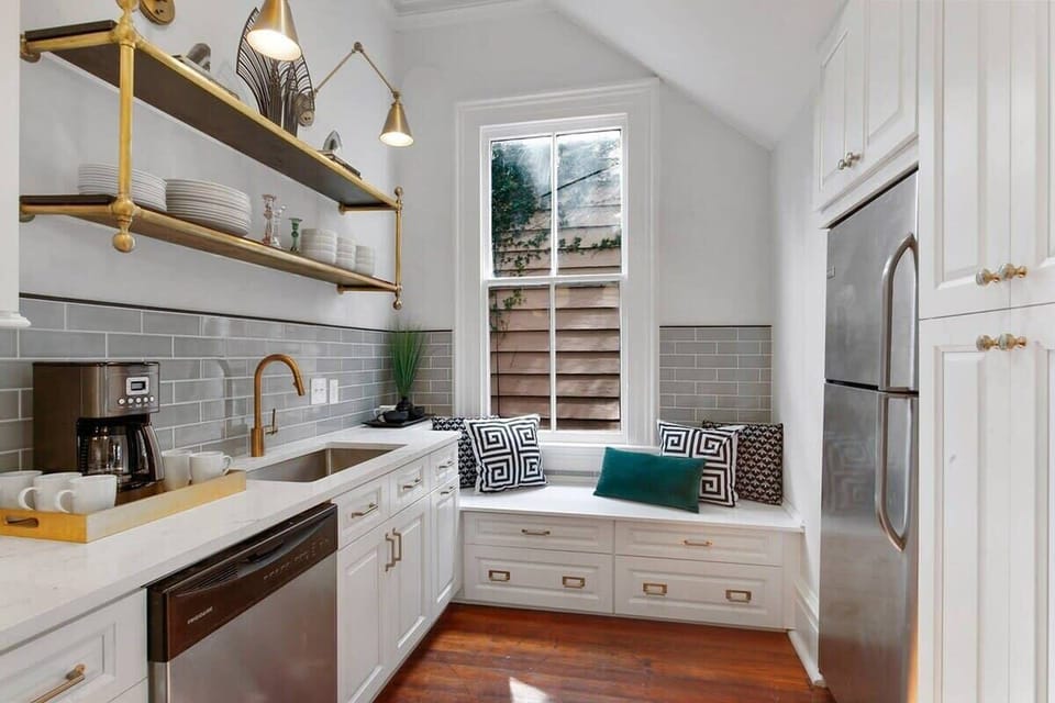 Kitchen | Fully Stocked Kitchen with Natural Light | First Floor of Building — Unit on One Level
